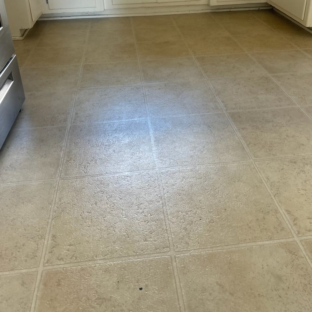 Kitchen floor before and after a move-out clean — after