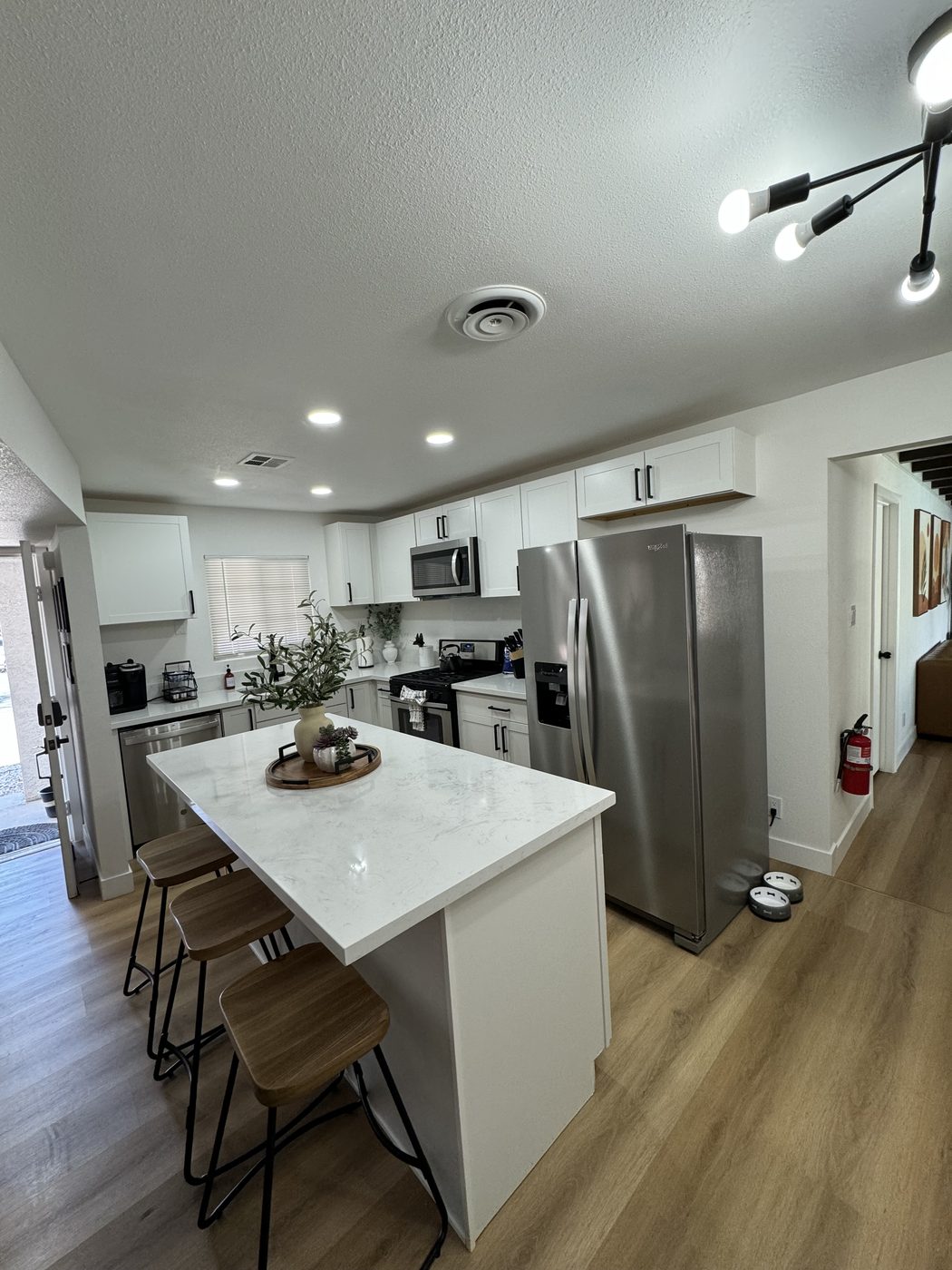 Wide view of a clean open-plan kitchen