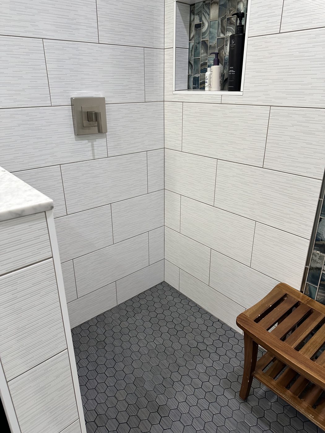 Close up of clean shower tile and grout